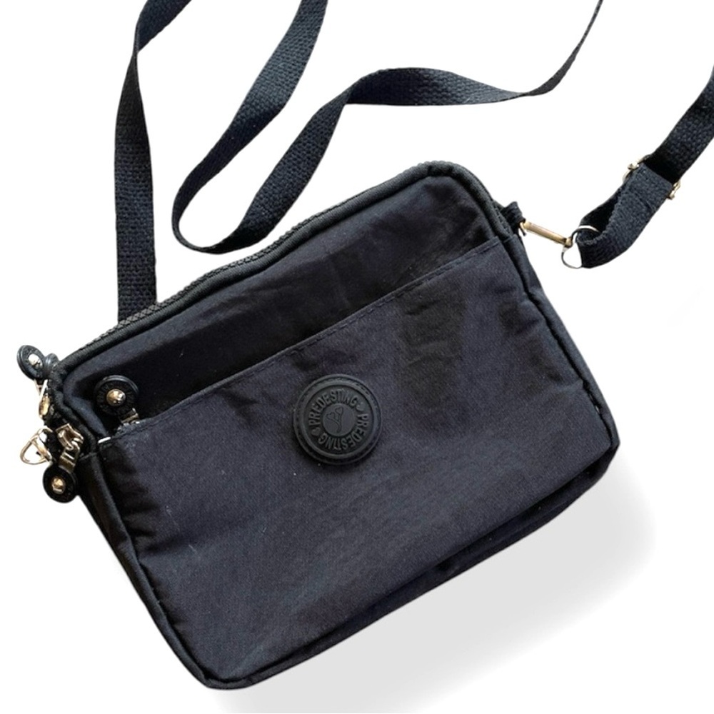 Black nylon crossbody bag multiple zipper and pockets NWT